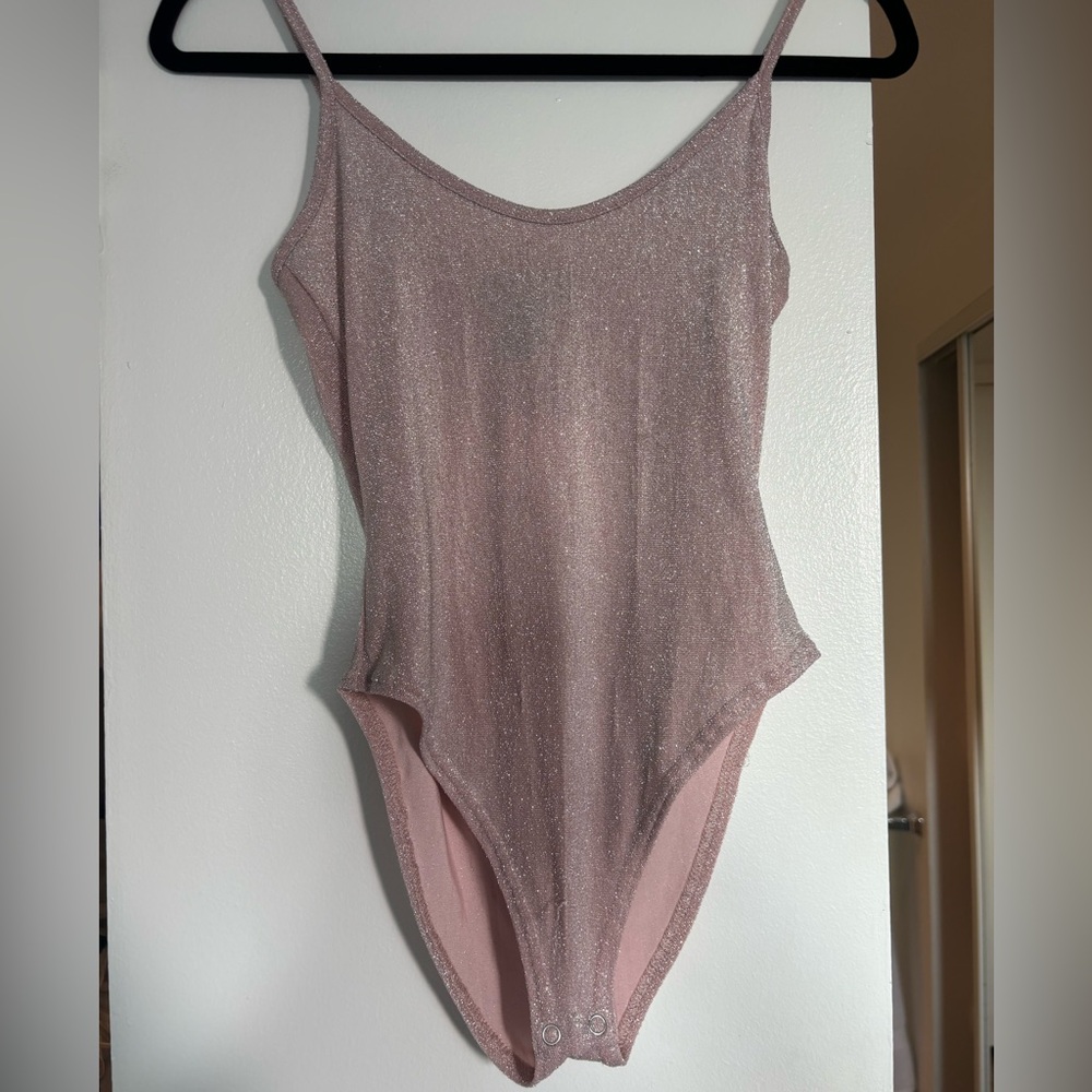 Pale pink sparkly bodysuit